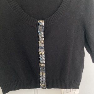 Black cardigan, embellished, cropped.